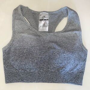 Brand new AYBL padded sports bra with very cute cut out on back size S